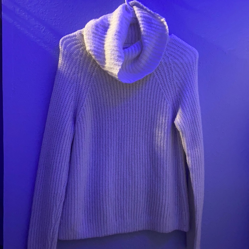 a white turtle neck